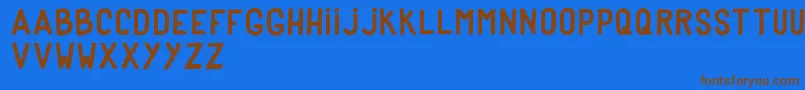 DkerPoster Font – Brown Fonts on Blue Background