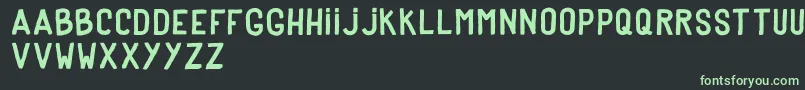 DkerPoster Font – Green Fonts on Black Background