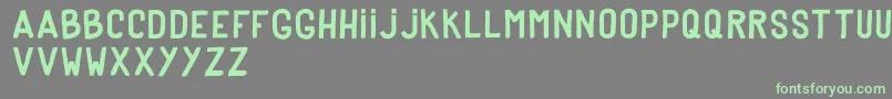 DkerPoster Font – Green Fonts on Gray Background