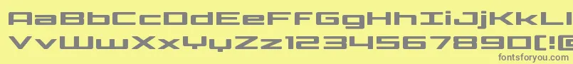 フォントPhoenicialowercaseexpand – 黄色の背景に灰色の文字