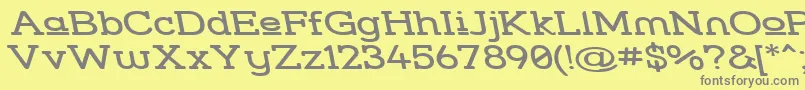 フォントStresuwr – 黄色の背景に灰色の文字