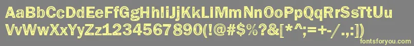 Czcionka Funky33Bold – żółte czcionki na szarym tle