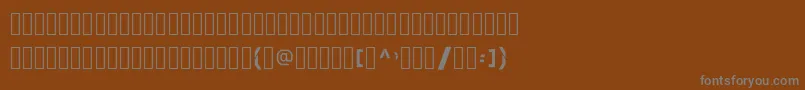 fuente SkewedCharacters – Fuentes Grises Sobre Fondo Marrón