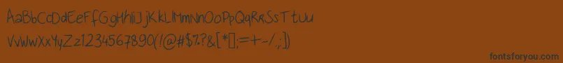 Handwritingfont Font – Black Fonts on Brown Background