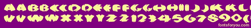 Klitschkotiquaround Font – Yellow Fonts on Purple Background