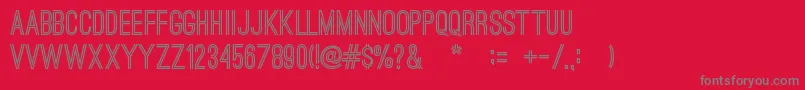 フォントOstrichSansBold – 赤い背景に灰色の文字
