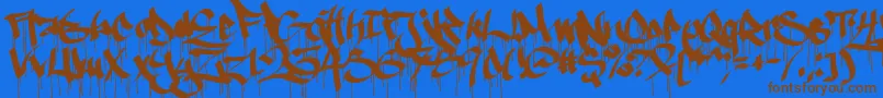 Ruthlessdrippin1-Schriftart – Braune Schriften auf blauem Hintergrund