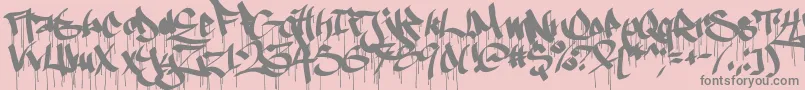 Ruthlessdrippin1-fontti – harmaat kirjasimet vaaleanpunaisella taustalla