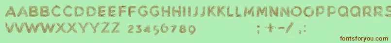 MinkdemoBold-fontti – ruskeat fontit vihreällä taustalla