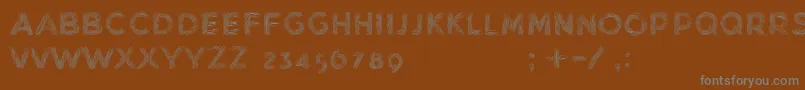 MinkdemoBold Font – Gray Fonts on Brown Background