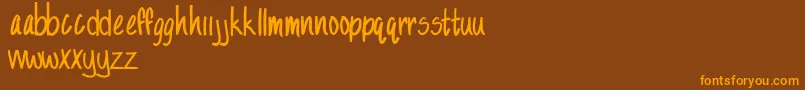 SandySandy Font – Orange Fonts on Brown Background