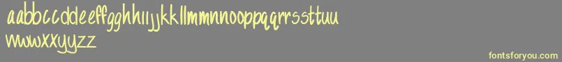 SandySandy Font – Yellow Fonts on Gray Background