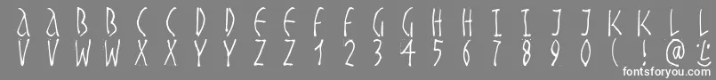 Handwrittenslim Font – White Fonts on Gray Background