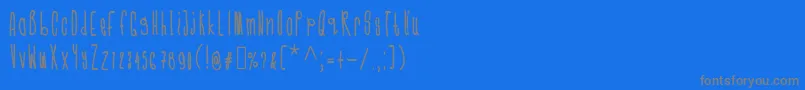 Cmonkeebold-Schriftart – Graue Schriften auf blauem Hintergrund