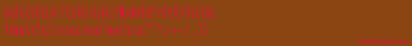 フォントCmonkeebold – 赤い文字が茶色の背景にあります。