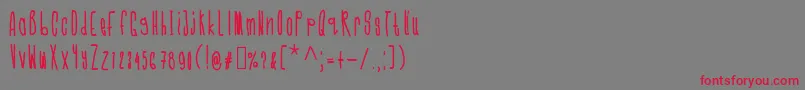 Cmonkeebold-Schriftart – Rote Schriften auf grauem Hintergrund