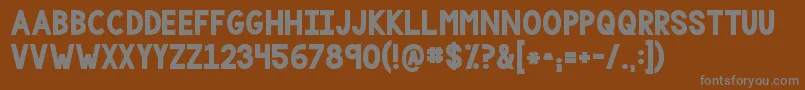 フォントKgonemorelightbig – 茶色の背景に灰色の文字