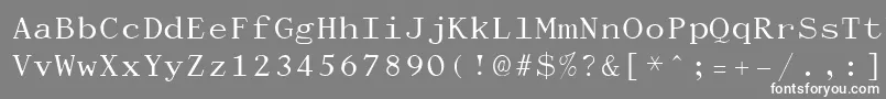 フォントDactylographe – 灰色の背景に白い文字