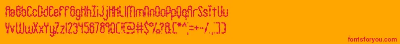 WigglySquigglyBrk-fontti – punaiset fontit oranssilla taustalla