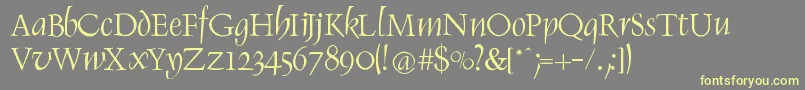 RenaissItalic Font – Yellow Fonts on Gray Background