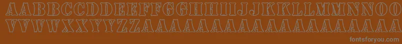 BoneyardArmy-fontti – harmaat kirjasimet ruskealla taustalla