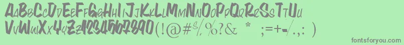 フォントLynaKety – 緑の背景に灰色の文字
