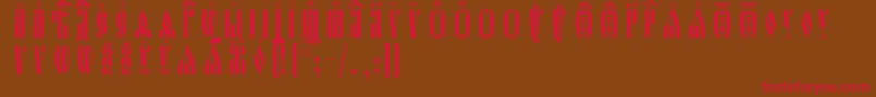 フォントOglavieIeucsSpacedout – 赤い文字が茶色の背景にあります。