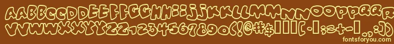 Vitaminoutline Font – Yellow Fonts on Brown Background