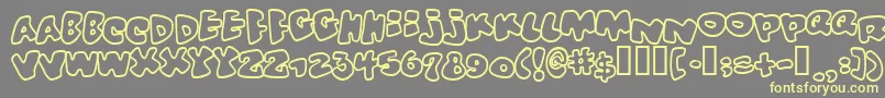 Vitaminoutline Font – Yellow Fonts on Gray Background