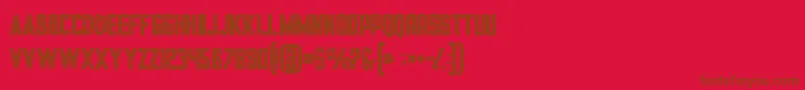 フォントTronboldinline – 赤い背景に茶色の文字