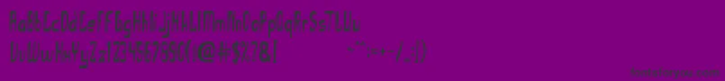 TheUglyFont-fontti – mustat fontit violetilla taustalla