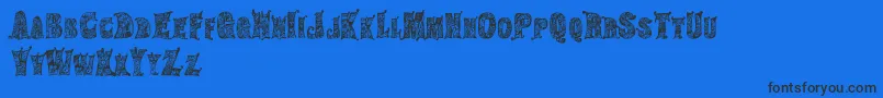HippiegypsyRegular-Schriftart – Schwarze Schriften auf blauem Hintergrund