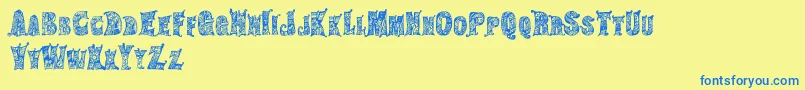 HippiegypsyRegular Font – Blue Fonts on Yellow Background
