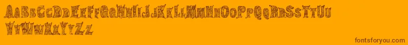 HippiegypsyRegular-Schriftart – Braune Schriften auf orangefarbenem Hintergrund