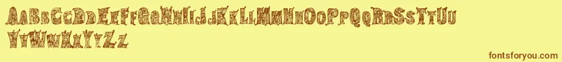 HippiegypsyRegular-Schriftart – Braune Schriften auf gelbem Hintergrund