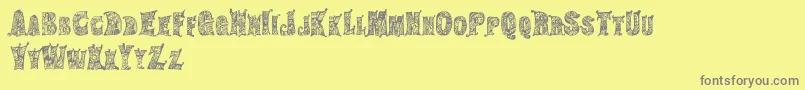 HippiegypsyRegular Font – Gray Fonts on Yellow Background