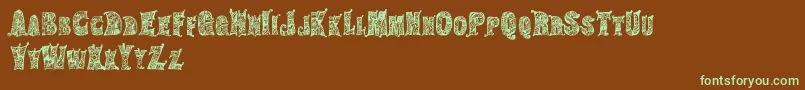 HippiegypsyRegular Font – Green Fonts on Brown Background