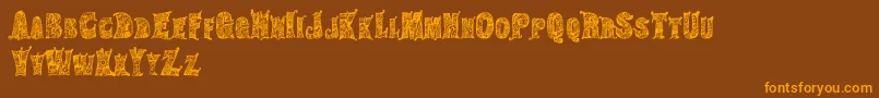 HippiegypsyRegular Font – Orange Fonts on Brown Background