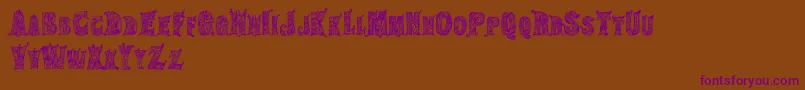 HippiegypsyRegular Font – Purple Fonts on Brown Background