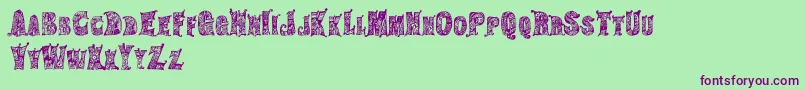 HippiegypsyRegular-Schriftart – Violette Schriften auf grünem Hintergrund