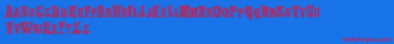 HippiegypsyRegular-Schriftart – Rote Schriften auf blauem Hintergrund