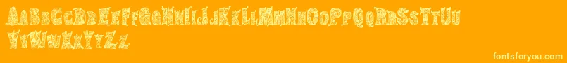 HippiegypsyRegular-Schriftart – Gelbe Schriften auf orangefarbenem Hintergrund