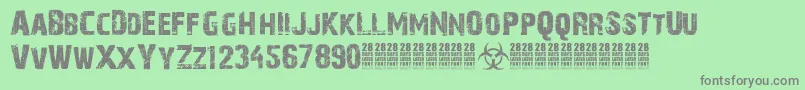 28DaysLaterCyr-Schriftart – Graue Schriften auf grünem Hintergrund