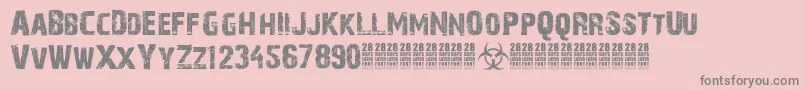 28DaysLaterCyr-fontti – harmaat kirjasimet vaaleanpunaisella taustalla