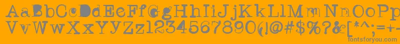 Twritertwo-Schriftart – Graue Schriften auf orangefarbenem Hintergrund