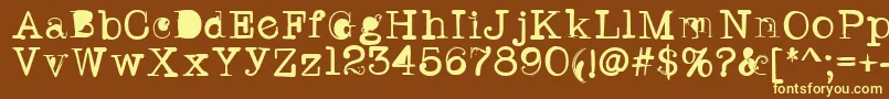 Twritertwo-Schriftart – Gelbe Schriften auf braunem Hintergrund