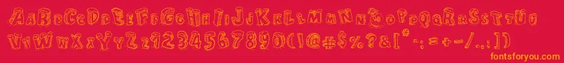 CartoonBlocksChristmas-Schriftart – Orangefarbene Schriften auf rotem Hintergrund