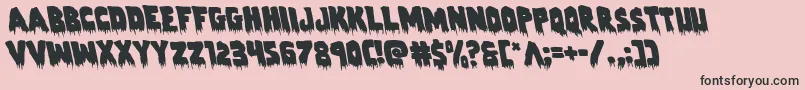 フォントZombiecontrolleft – ピンクの背景に黒い文字