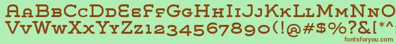 GroverSlabCaps-fontti – ruskeat fontit vihreällä taustalla