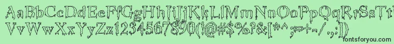 JinkeezOut Font – Black Fonts on Green Background